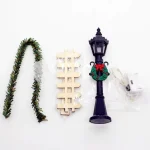 Lantaarn met kerstkrans, hekje, guirlande, led-lampjes, 12cm  (kerst-winter)